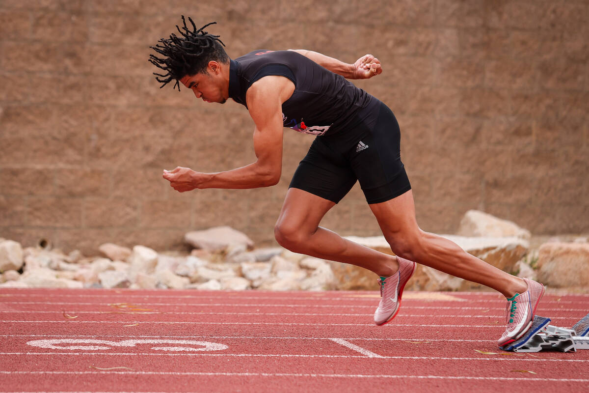 Liberty High School senior Sean Craig takes off from the starting block during the NIAA 5A Boys ...