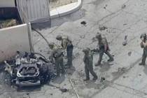 Law enforcement investigate a vehicle after an explosion on Saturday, May 17, 2025 in Palm Spri ...