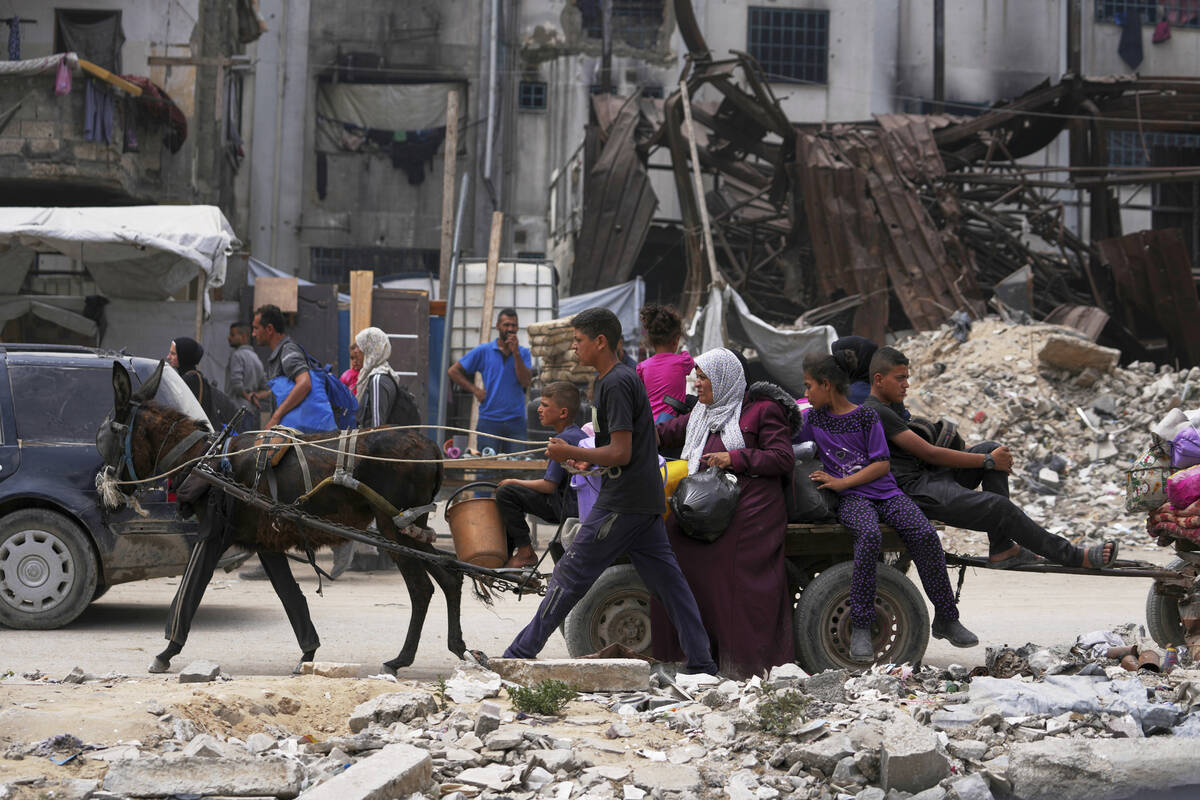 Displaced Palestinians fleeing Beit Lahia amid ongoing Israeli military operations in the Gaza ...