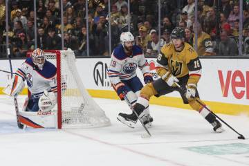 Golden Knights left wing Pavel Dorofeyev (16) tries to get around Edmonton Oilers center Adam H ...
