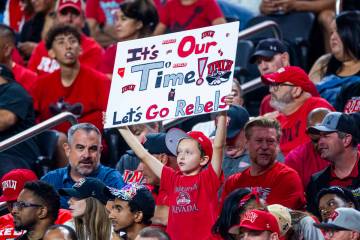 A young UNLV fan shows his support against the Boise State Broncos during the second half of th ...