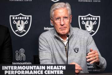 Raiders head coach Pete Carroll speaks during a news conference following the first round of th ...