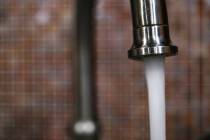 Water pours from a faucet Thursday, May 22, 2025, in Las Vegas. (Sam Morris/Las Vegas Review-Jo ...