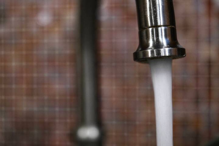 Water pours from a faucet Thursday, May 22, 2025, in Las Vegas. (Sam Morris/Las Vegas Review-Jo ...