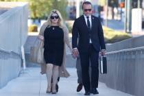 Former Las Vegas City Councilwoman Michele Fiore, left, arrives for her wire fraud trial at the ...