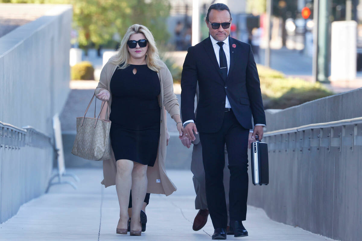 Former Las Vegas City Councilwoman Michele Fiore, left, arrives for her wire fraud trial at the ...