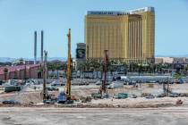 Construction crews drill caissons for the foundation of the new A's ballpark on the former Trop ...