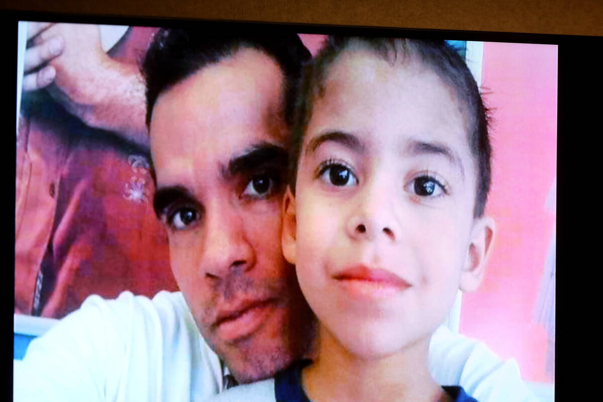 An evidence photo is shown as Eric Echevarria Jr. testifies on the witness stand during the wro ...