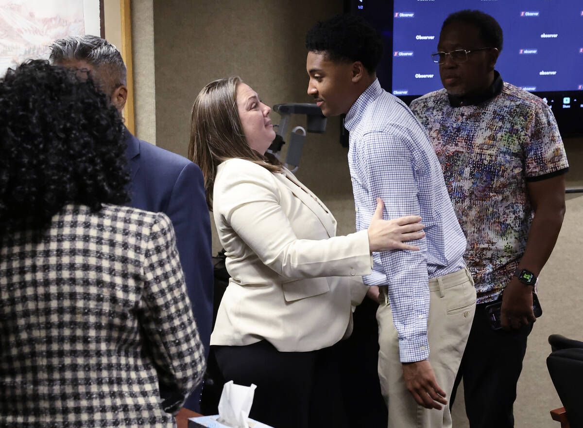 Former UNLV basketball recruit Zaon Collins is comforted by his attorney Stephanie Zinna after ...