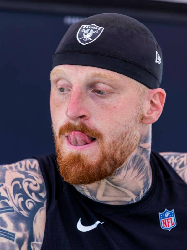 Raiders defensive end Max Crosby (98) listens top a question by the media during Raiders OTA pr ...