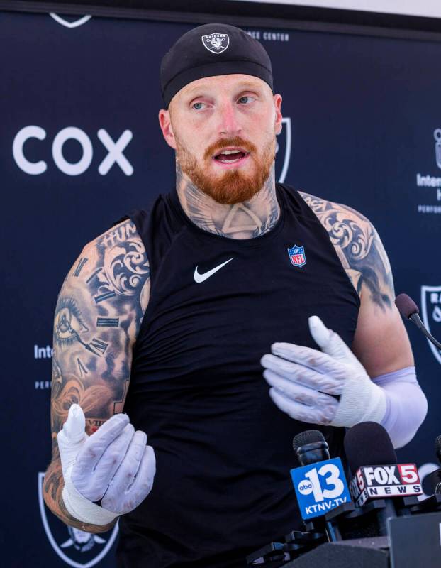 Raiders defensive end Max Crosby (98) speaks to the media during Raiders OTA practice at the In ...