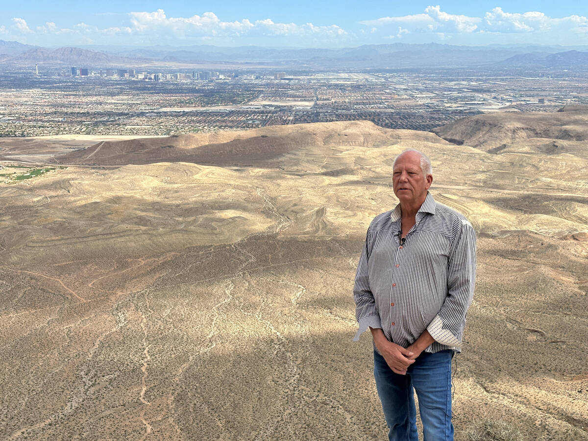 Developer Jim Rhodes shows a view of the Las Vegas Valley from his Blue Diamond Hill Gypsum Min ...