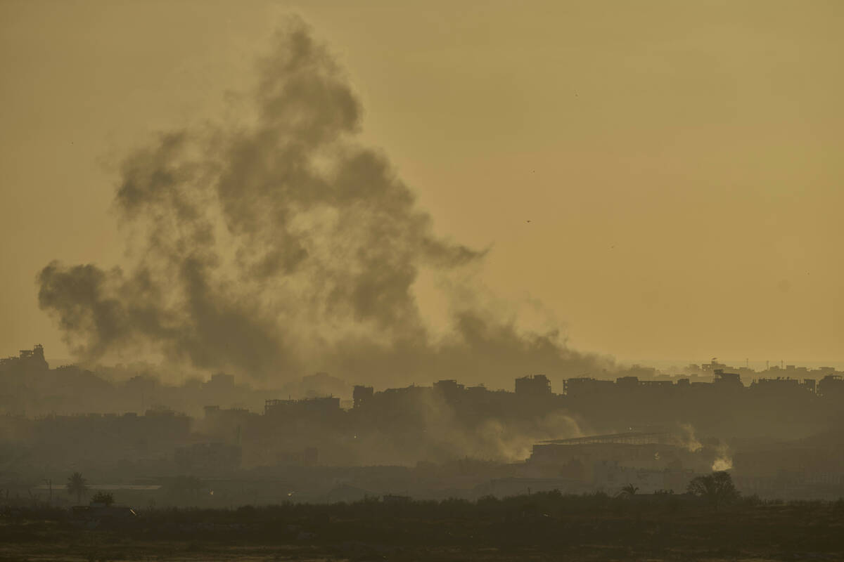 Smoke rises following an Israeli army bombardment in the Gaza Strip, seen from southern Israel, ...