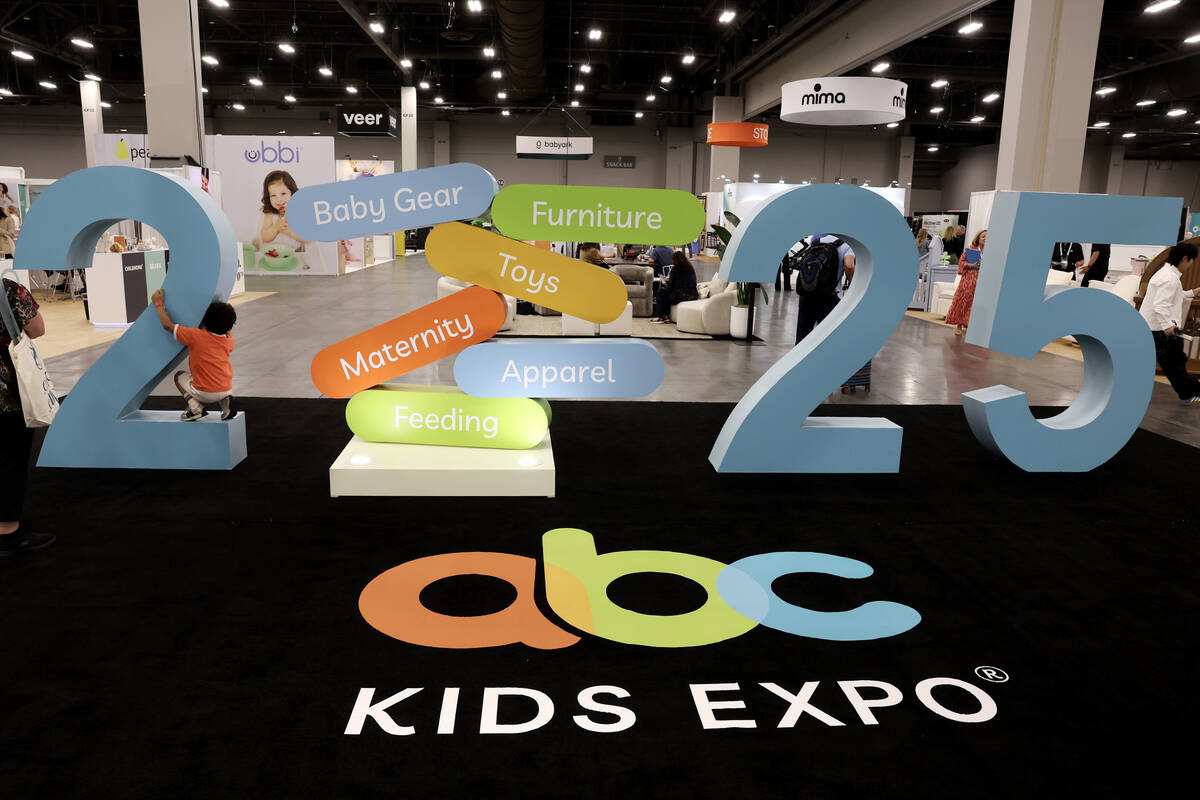 Conventioneers walk the show floor during the ABC Kids Expo at Mandalay Bay Convention Center i ...