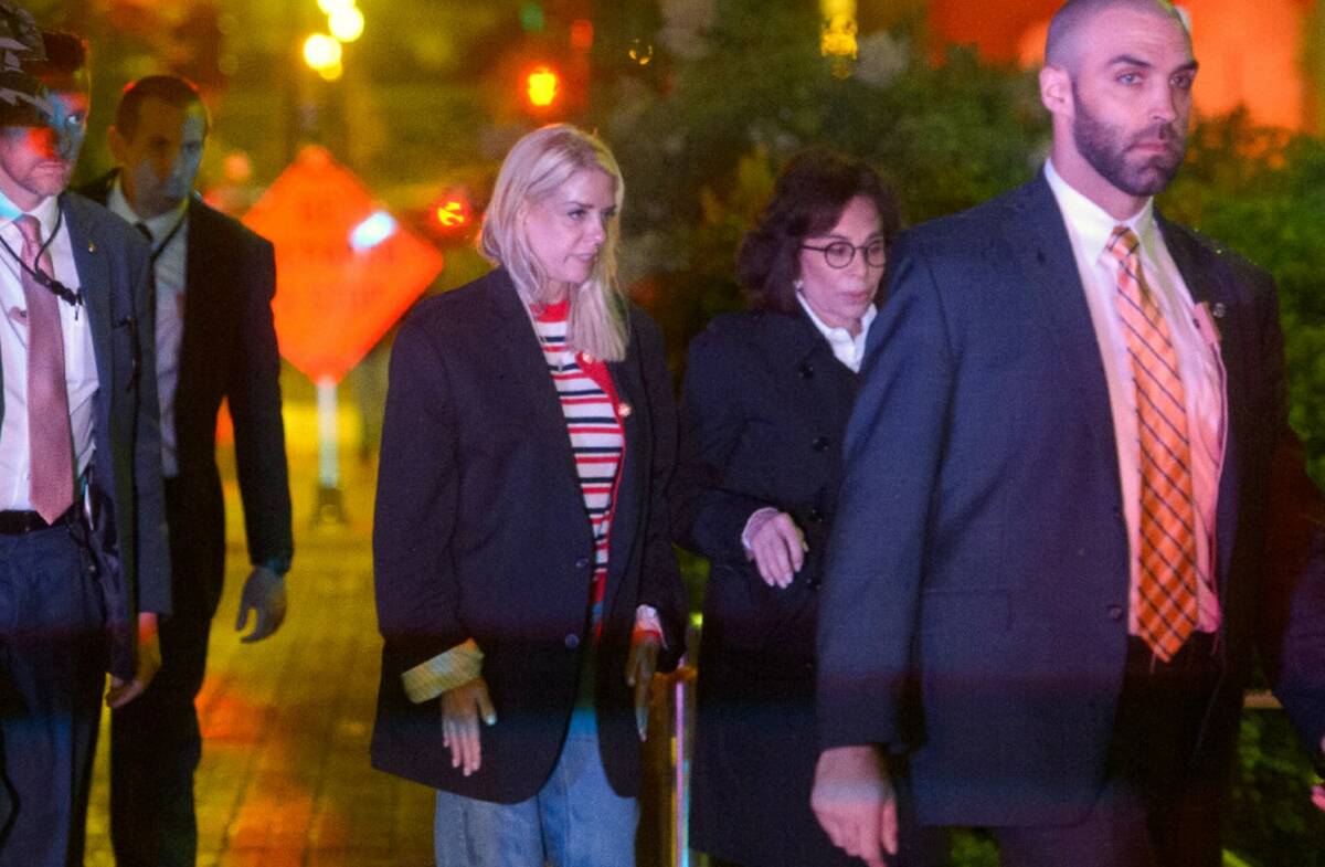 Attorney General Pam Bondi, center, and U.S. Attorney for the District of Columbia Jeanine Pirr ...