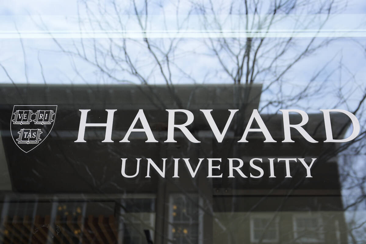 FILE - The Harvard University logo is displayed on a building at the school, Tuesday, April 15, ...