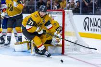 Golden Knights center William Karlsson (71) looks to send the puck up ice against the Edmonton ...