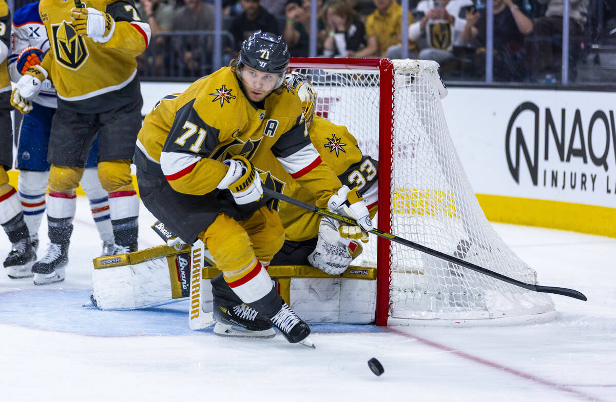 Golden Knights center William Karlsson (71) looks to send the puck up ice against the Edmonton ...