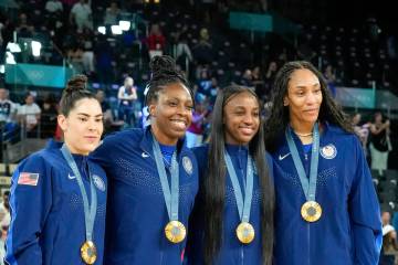 Kelsey Plum of United States, Chelsea Gray of United States, Jackie Young of United States, A'J ...
