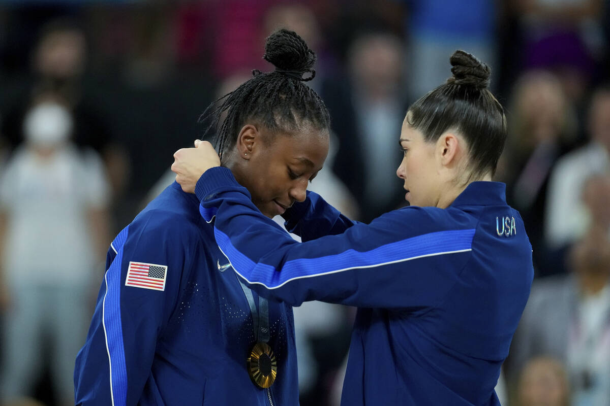 Kelsey Plum, right, and Jewell Loyd of United States with their gold medal after winning the Wo ...