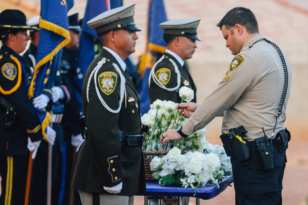 Officers with the Metropolitan Police Department carry flowers in during the annual Southern Ne ...