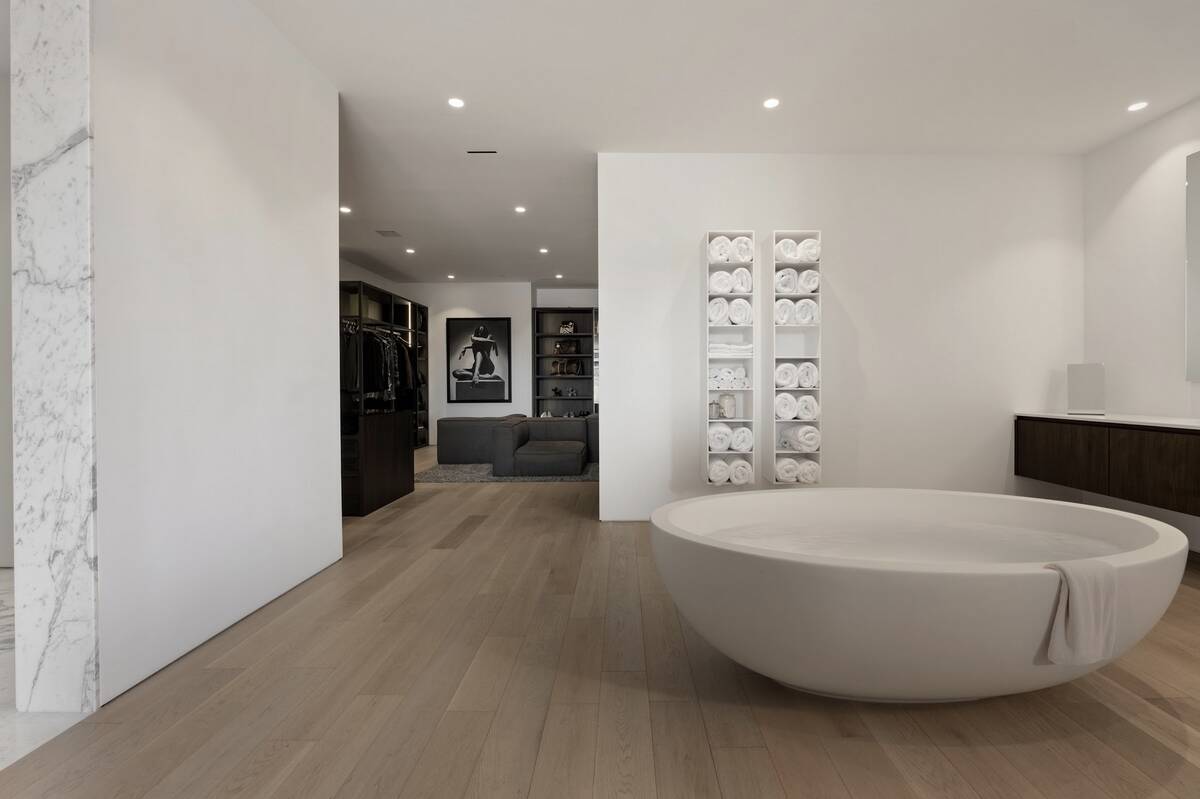 Located at 14 Magic Stone Lane, the home was listed for $16.95 million and sold for $14.7 milli ...