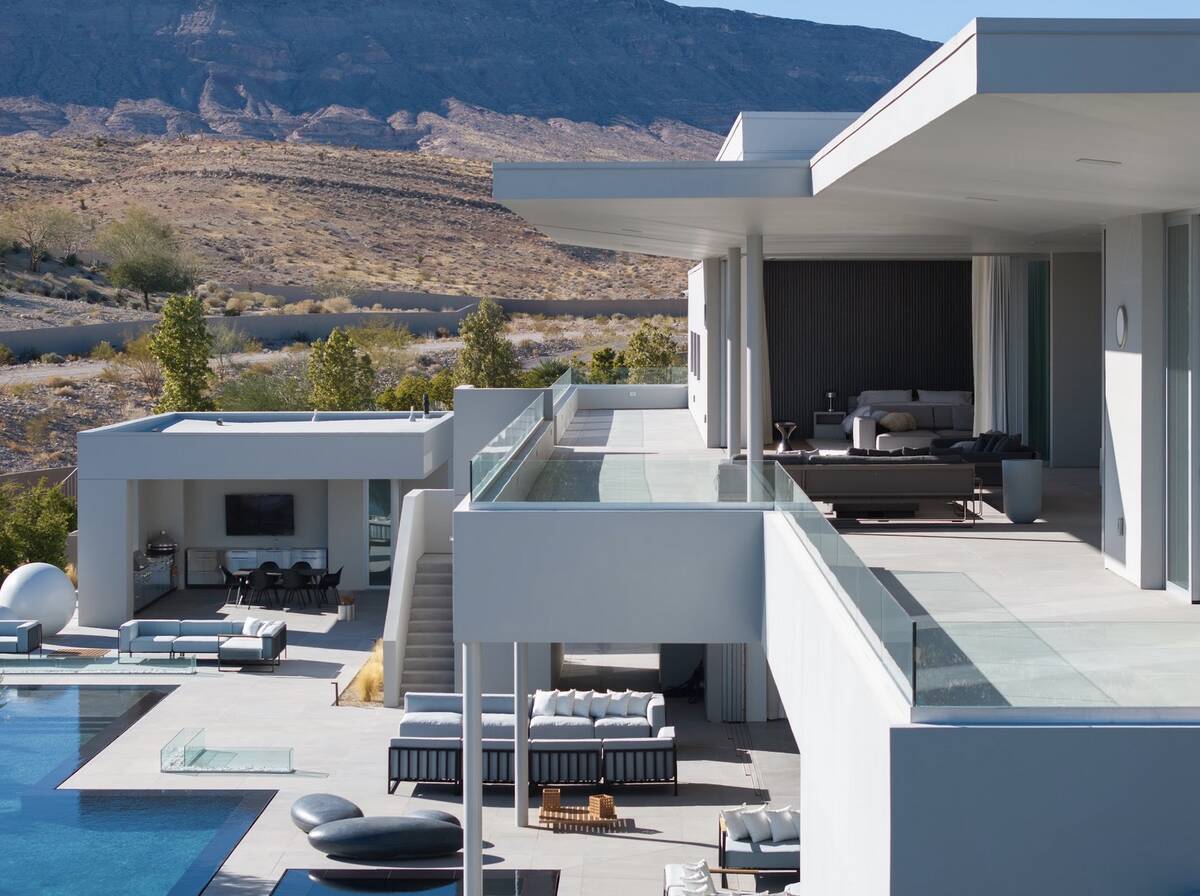 Located at 14 Magic Stone Lane, the home was listed for $16.95 million and sold for $14.7 milli ...