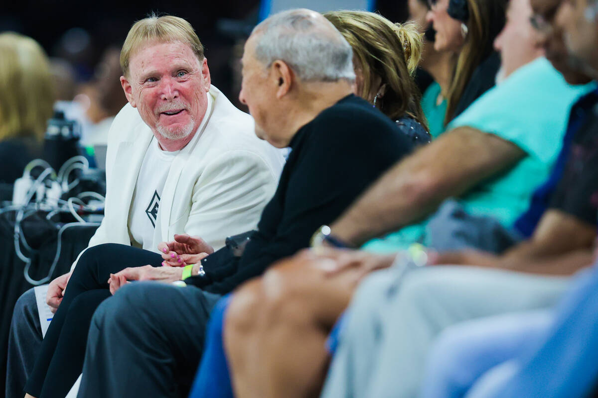 Raiders and Aces majority owner Mark Davis sits front row during a WNBA basketball game between ...