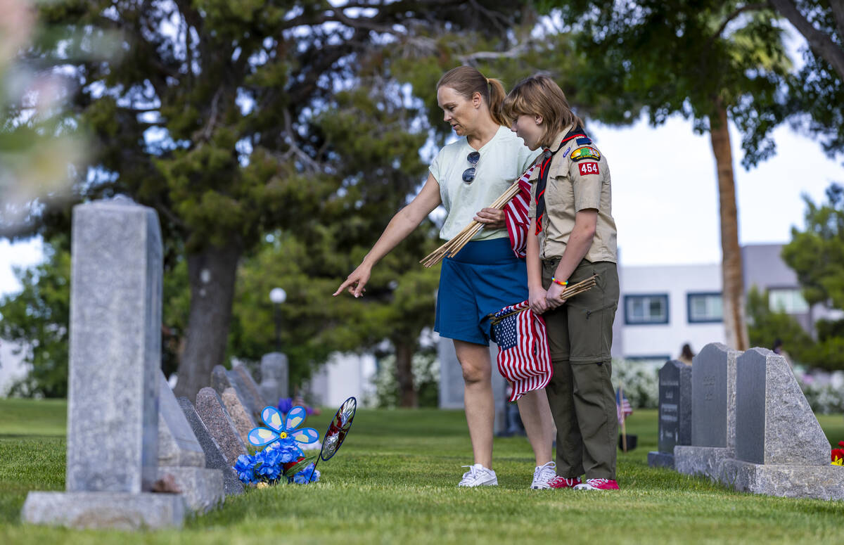 Scouting America's Kit Landman, 12, with Troop #360, and Elizabeth Landman are interested in th ...