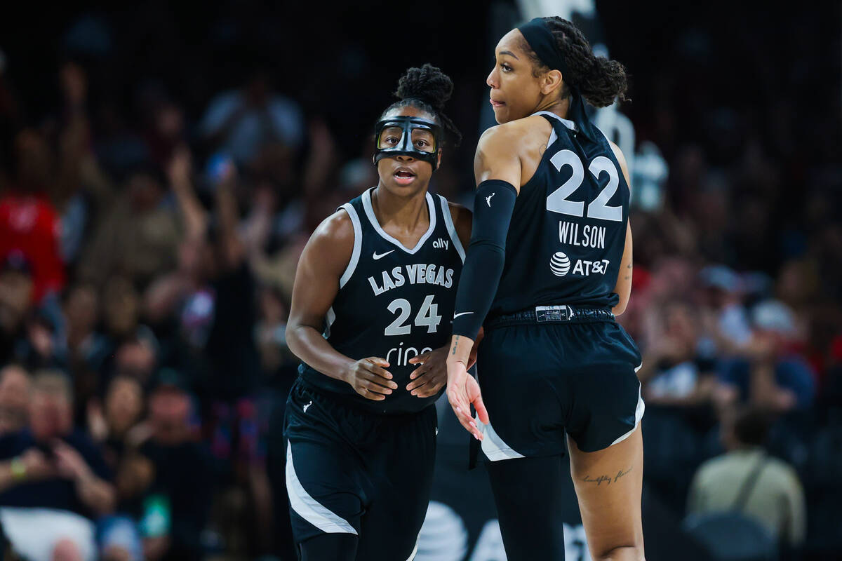 Aces center A'ja Wilson (22) and Aces guard Jewell Loyd (24) during a WNBA basketball game betw ...