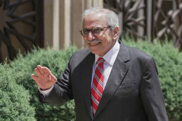 Lebanese Prime Minister Nawaf Salam gestures to journalists while waiting to welcome Palestinia ...