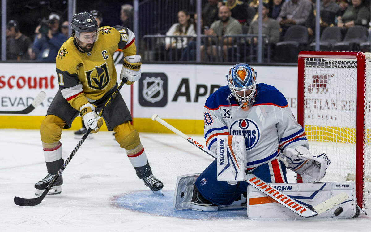 rGolden Knights right wing Mark Stone (61) watches as a puck is blocked by Edmonton Oilers goal ...