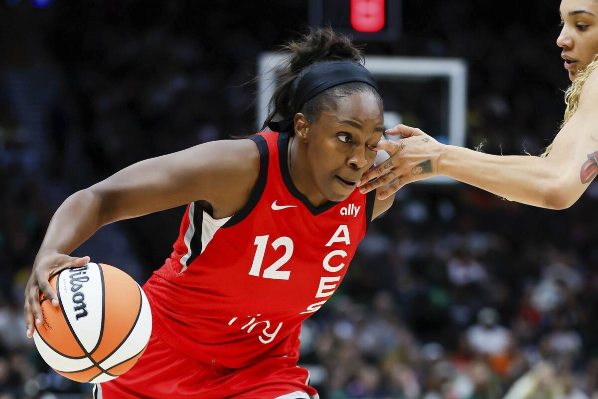 Las Vegas Aces guard Chelsea Gray gets poked in the eye by Seattle Storm forward Gabby Williams ...