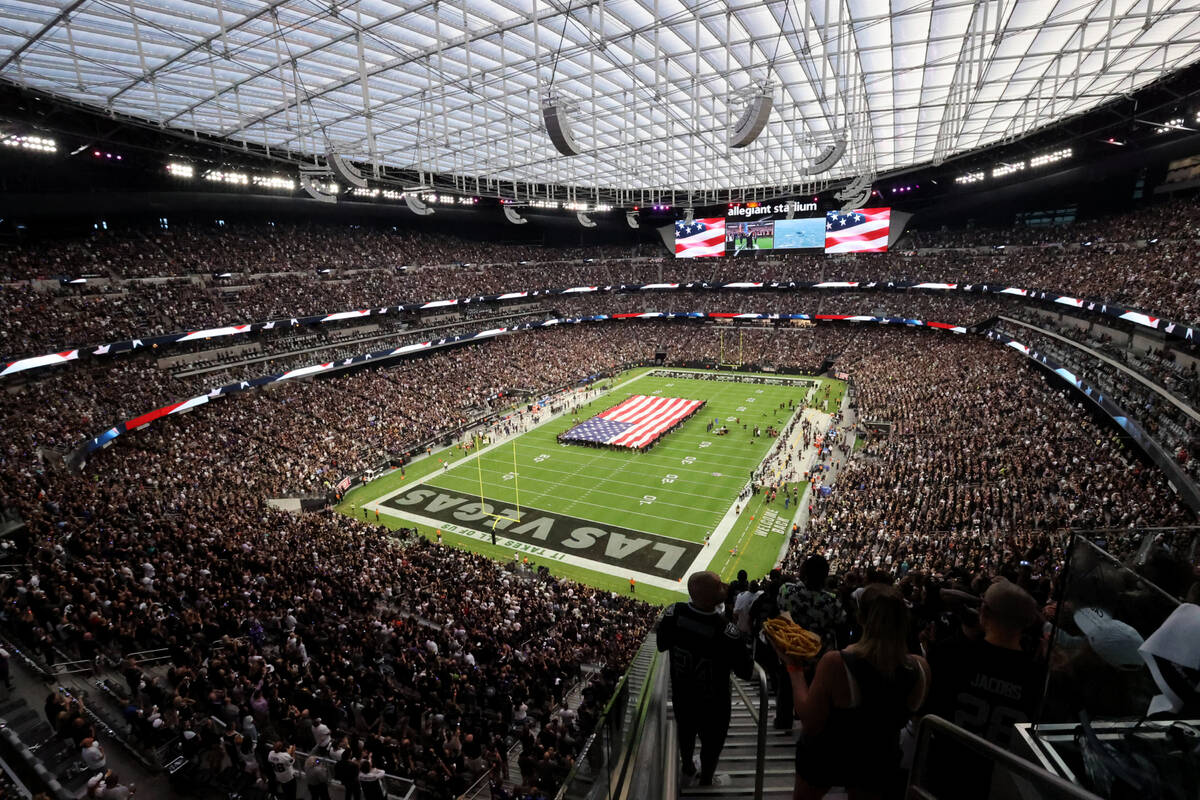 Fans stand for the National Anthem before the Raiders take on the Baltimore Ravens on ÒMon ...