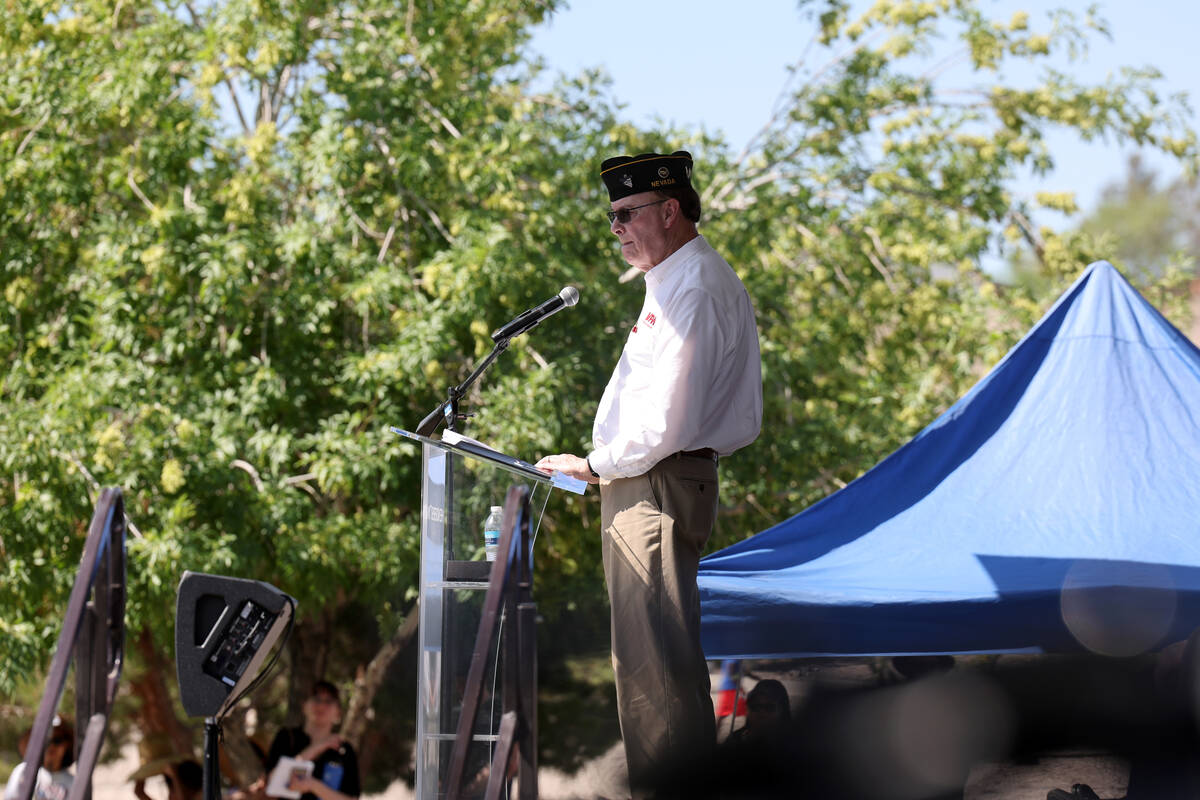 Veteran Larry Brower delivers the keynote address during the Field of Honor ceremony at Corners ...