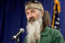Phil Robertson of the Duck Dynasty reality television program speaks at a Republican presidenti ...