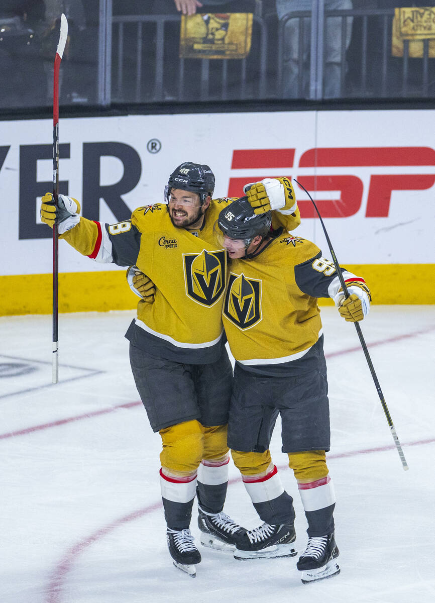 Golden Knights center Tomas Hertl (48) and Golden Knights right wing Victor Olofsson (95) celeb ...