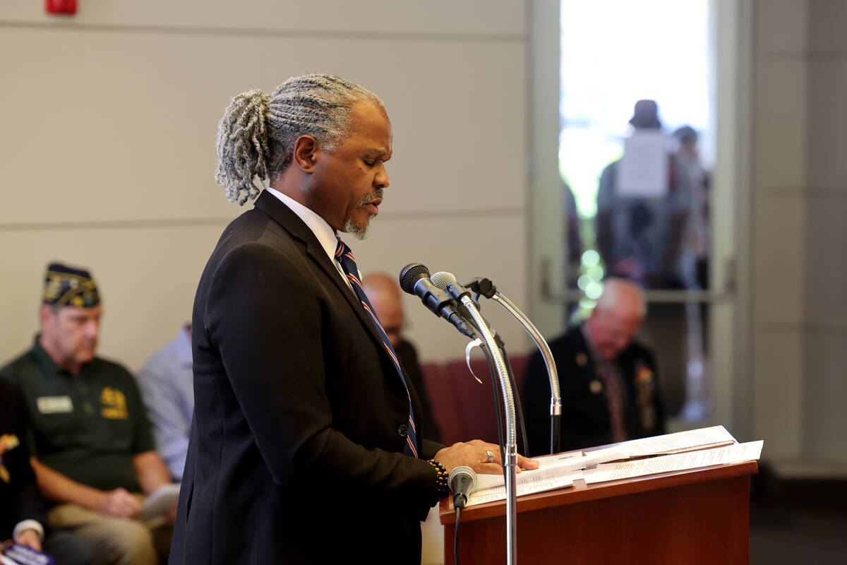 Chaplain Dwight Webster Sr. give the invocation during the Memorial Day ceremony at the Souther ...