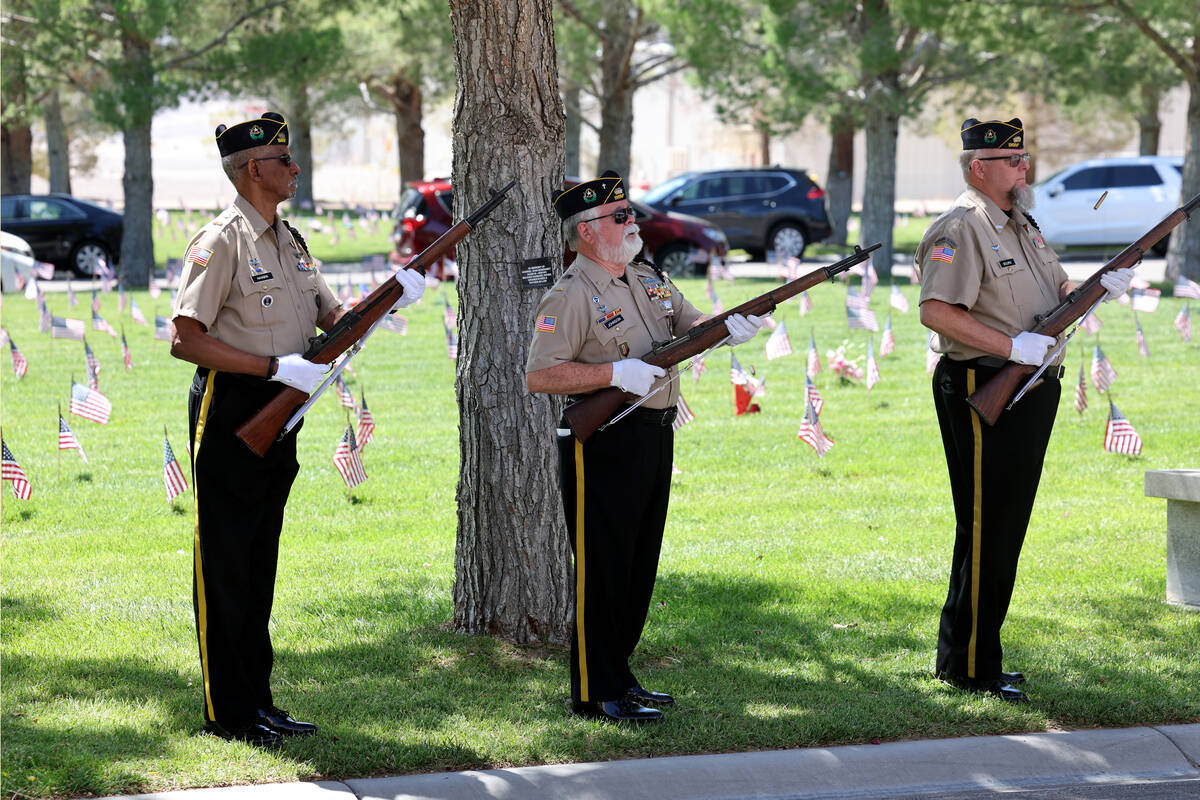 Firing Honor Guard with Black Mountain Chapter 12 Disabled American Veterans give a 21-gun salu ...