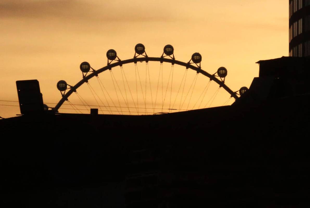 The High Roller is silhouetted against the morning sun in 2018 on the Las Vegas Strip. (Bizuaye ...