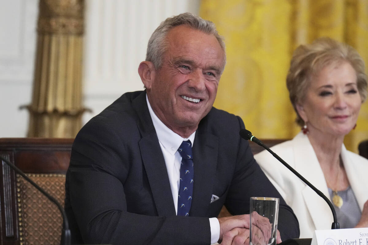 Health and Human Services Secretary Robert F. Kennedy Jr., left, and Education Secretary Linda ...