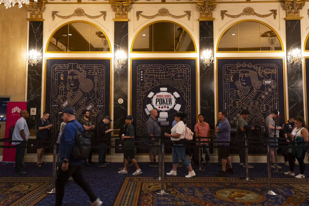 Attendees line up to register during the first day of the World Series of Poker on Tuesday, May ...