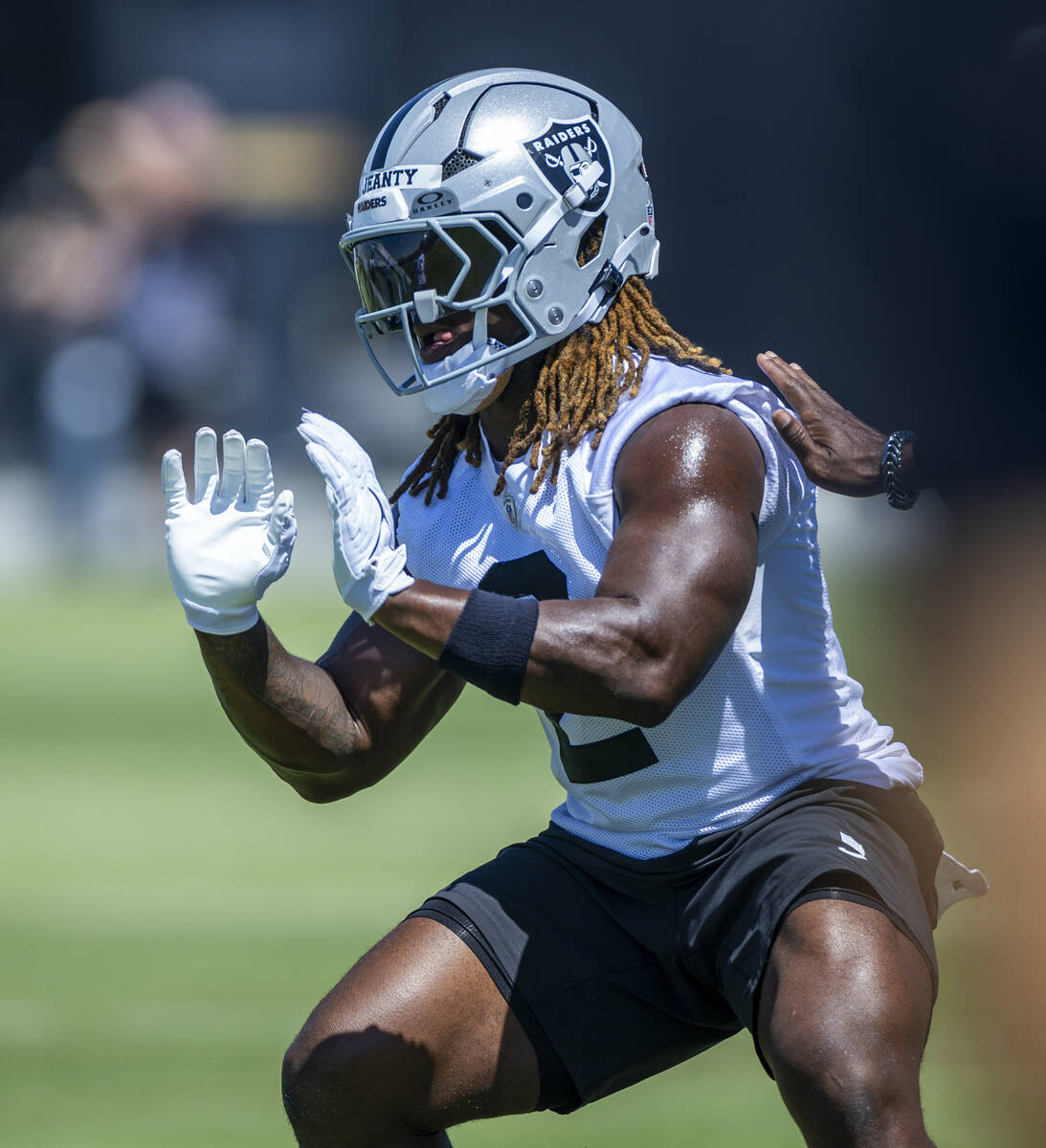 Raiders running back Ashton Jeanty (2) runs a drill during Raiders OTA practice at the Intermou ...
