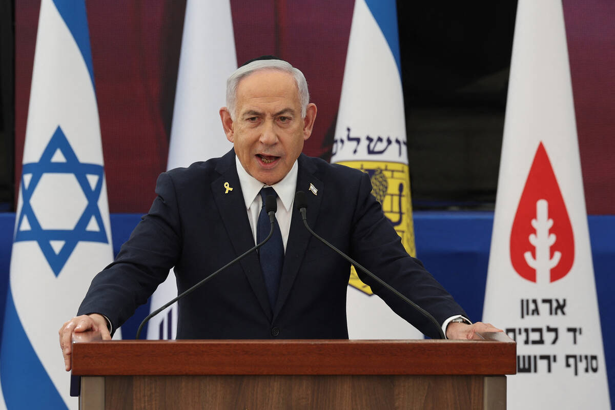 Israeli Prime Minister Benjamin Netanyahu speaks during the annual ceremony at the eve of Israe ...