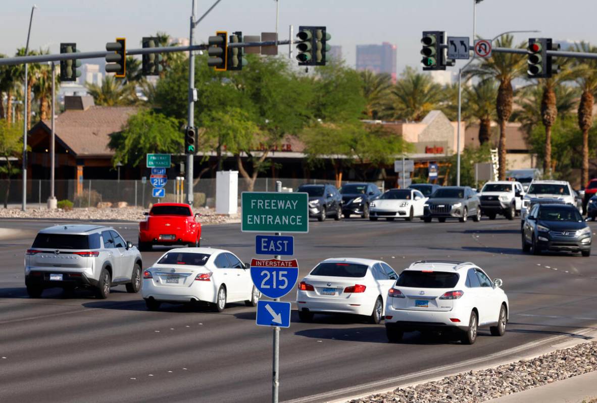 Motorists stop at the traffic lights on Green Valley Parkway near the 215 Beltway entrance on W ...