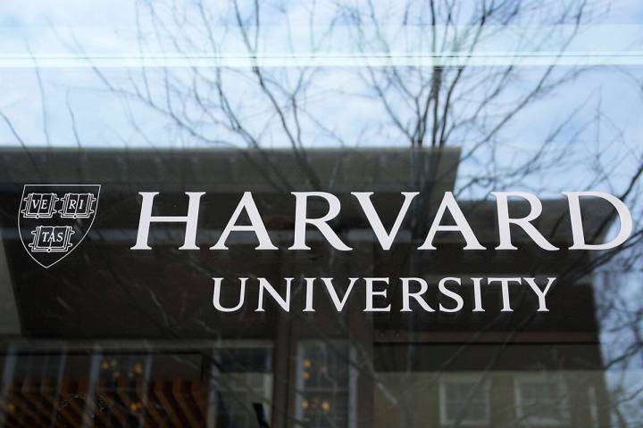 FILE - The Harvard University logo is displayed on a building at the school, Tuesday, April 15, ...