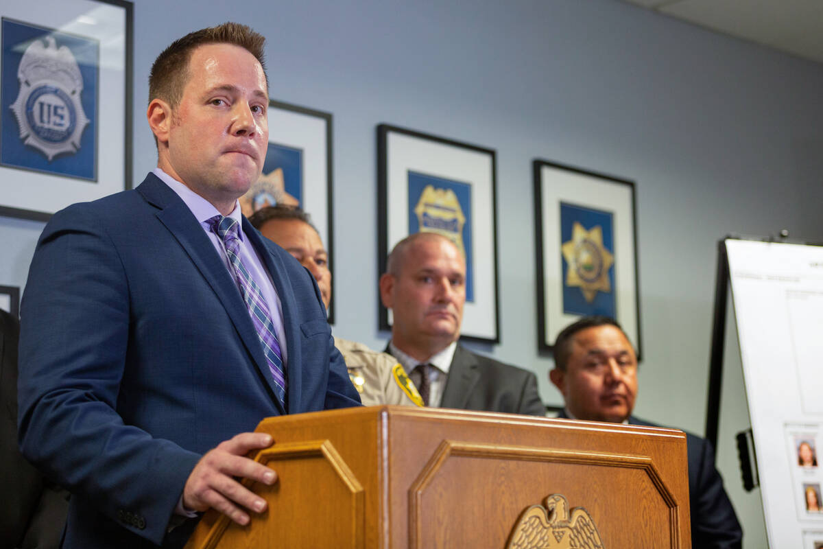 In this Review-Journal file photo, gang unit lieutenant Reggie Rader and other associated autho ...