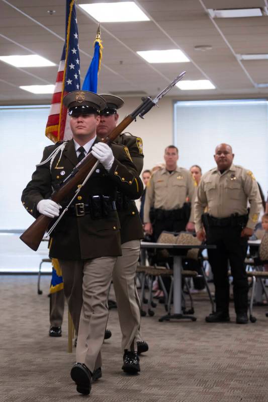 Members of the Las Vegas Metropolitan Police Department Honor Guard are seen at the start of a ...