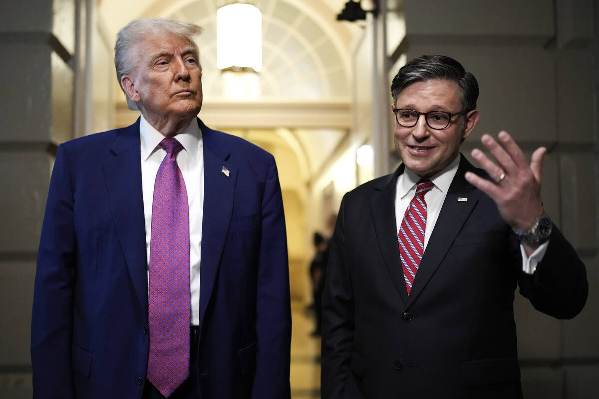 President Donald Trump and Speaker of the House Mike Johnson, R-La., speak to reporters after d ...