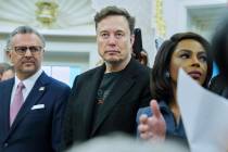 Elon Musk looks on as President Donald Trump meets South African President Cyril Ramaphosa in t ...